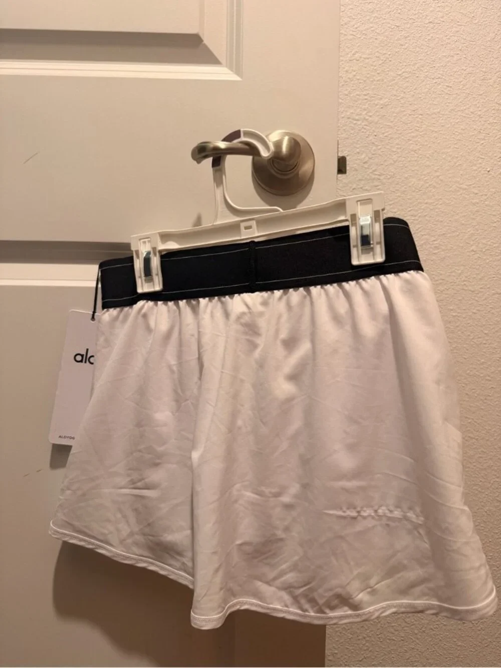 Alo Women's White Tennis Skirt with Black Waistband